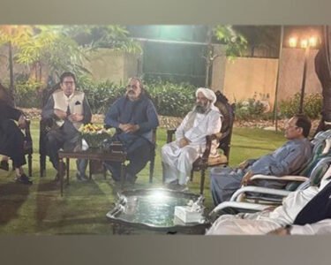 Government and opposition members are sitting together.